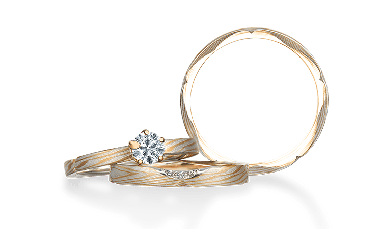伝統技法の木目金で製作された和風の手作り指輪「桜あわせ」のセットリング